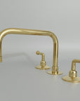 Gold brass bathroom faucet with lever handles