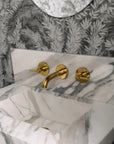 Unlacquered brass wall mounted faucet