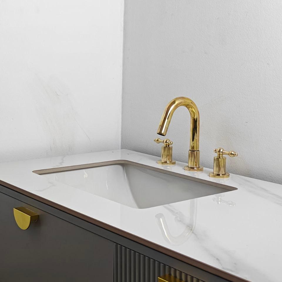 unlacquered brass three hole bathroom faucet with lever handle