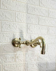 Unlacquered Brass Curved Wall Mounted faucet - Brasspure