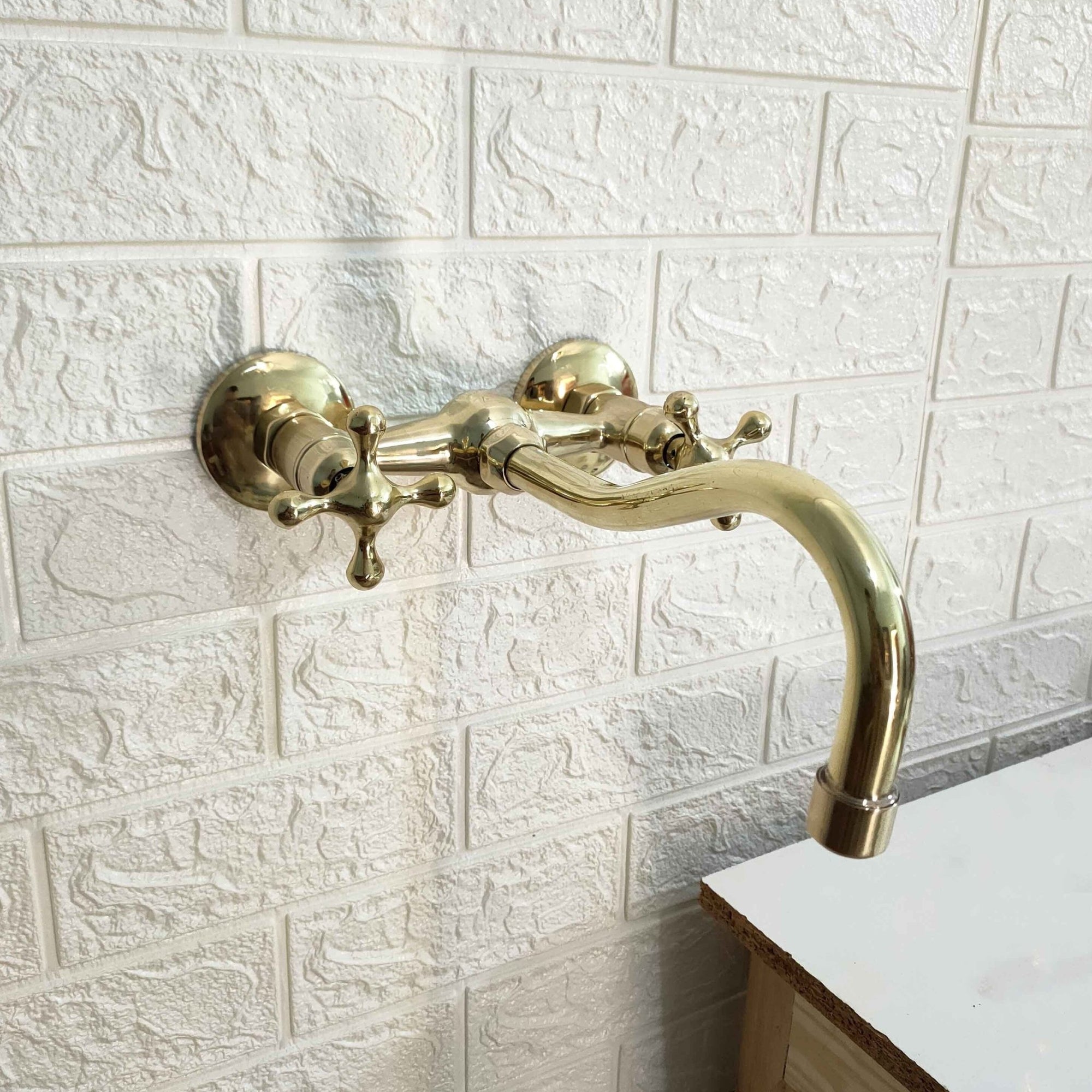 Unlacquered Brass Curved Wall Mounted faucet - Brasspure