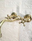 Unlacquered Brass Curved Wall Mounted faucet - Brasspure